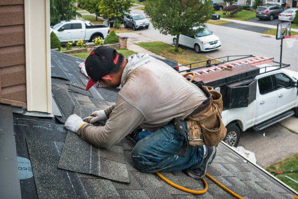 Professional Roofing technician working in Lincoln, MA